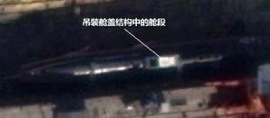 卫星图片显示的093G型指挥台围壳后面的凸出舱段